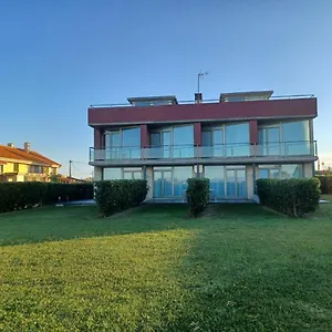 https://apartamentos-playa-de-portio.bilbaohotelsspain.com